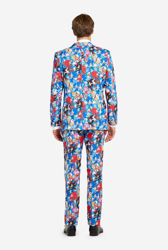 Man wearing colorful mens suit with Sonic the Hedgehog print, view from the back