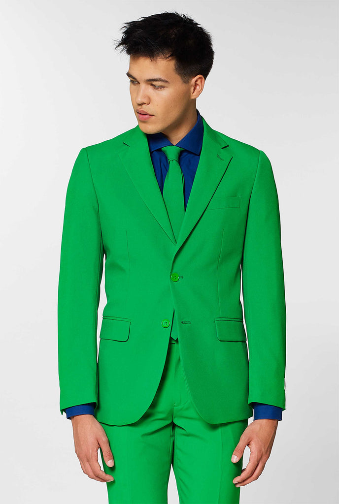 Filmpje van man die een OppoSuits Evergreen Groen herenpak draagt.