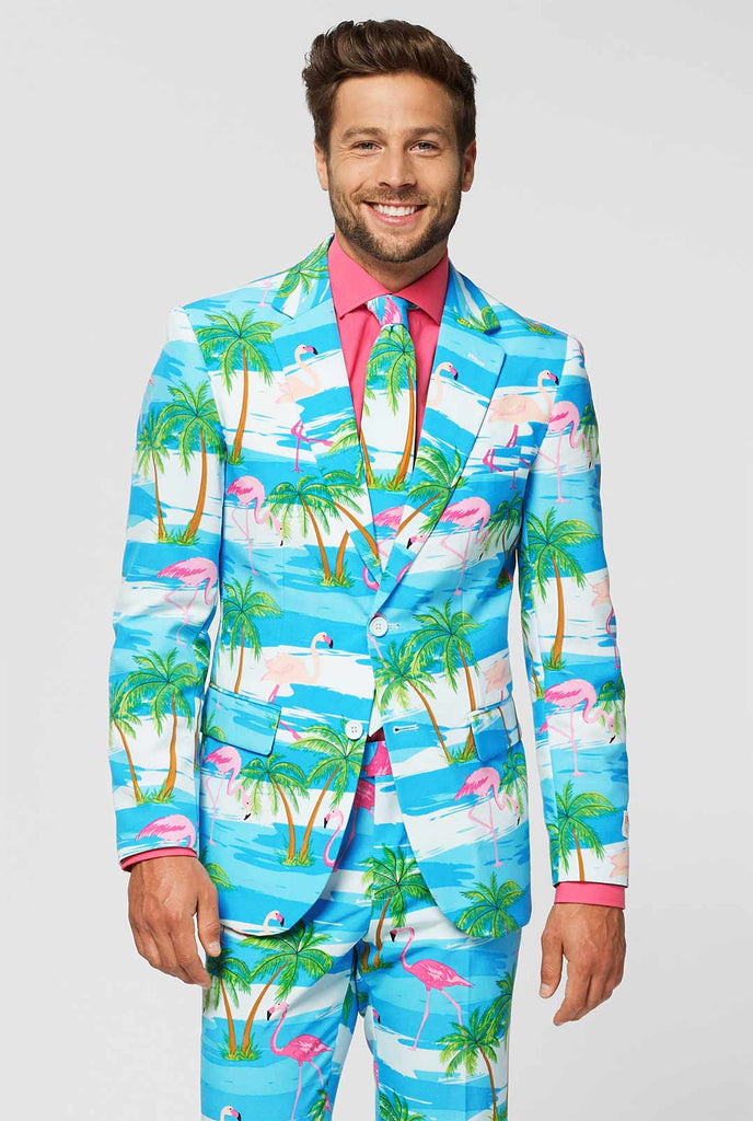 Filmpje van man die een OppoSuits Flaminguy blauw herenpak draagt.