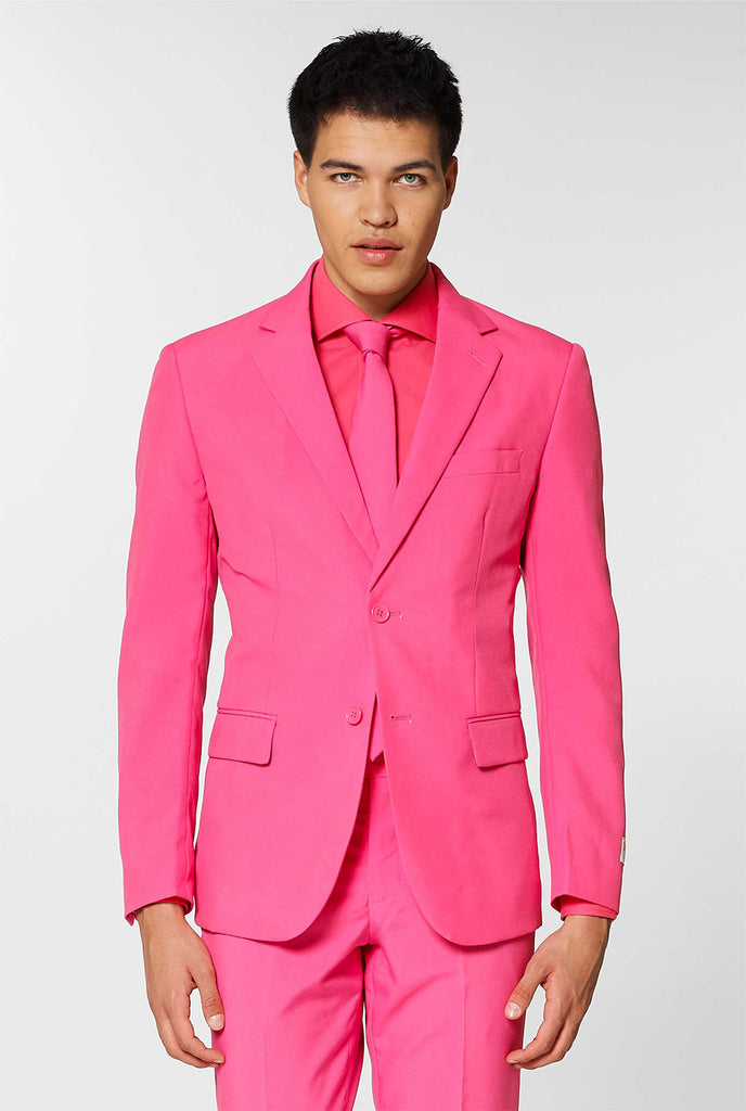 Video van man die een OppoSuits Mr. Pink roze herenpak draagt.